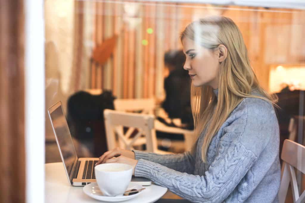 girl sitting in front of computer 